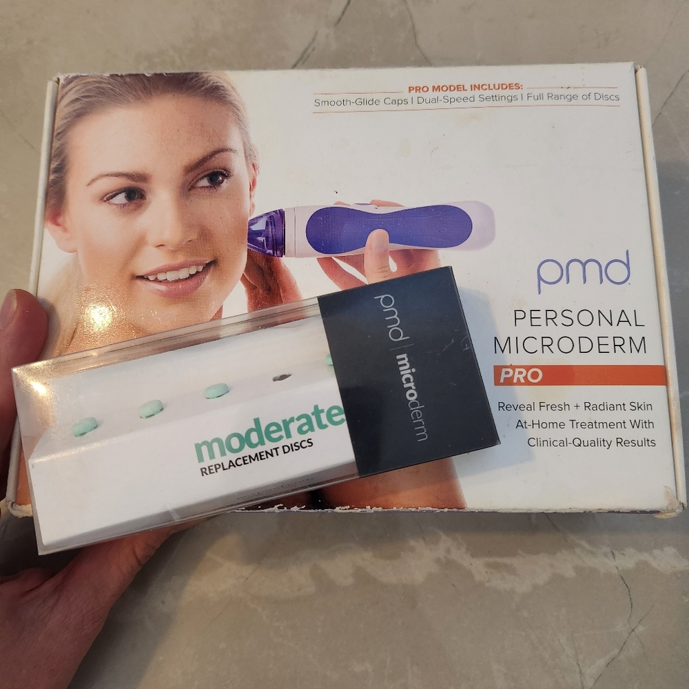Purple PMD Personal Microderm Device